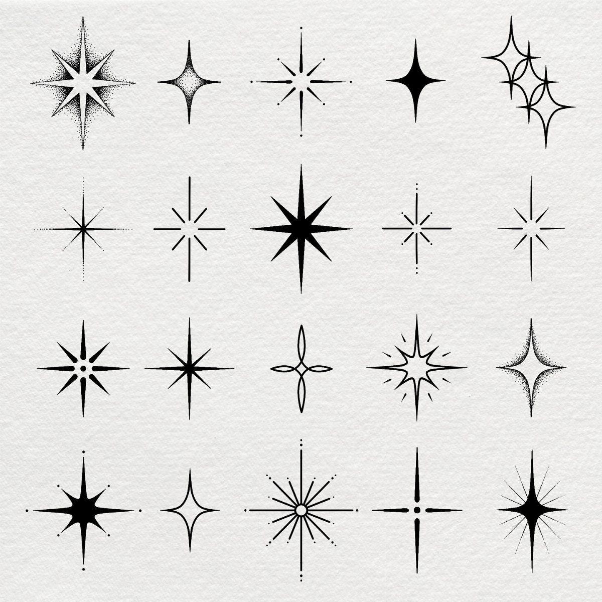 Black ink star and spark designs of various sizes on white textured paper.