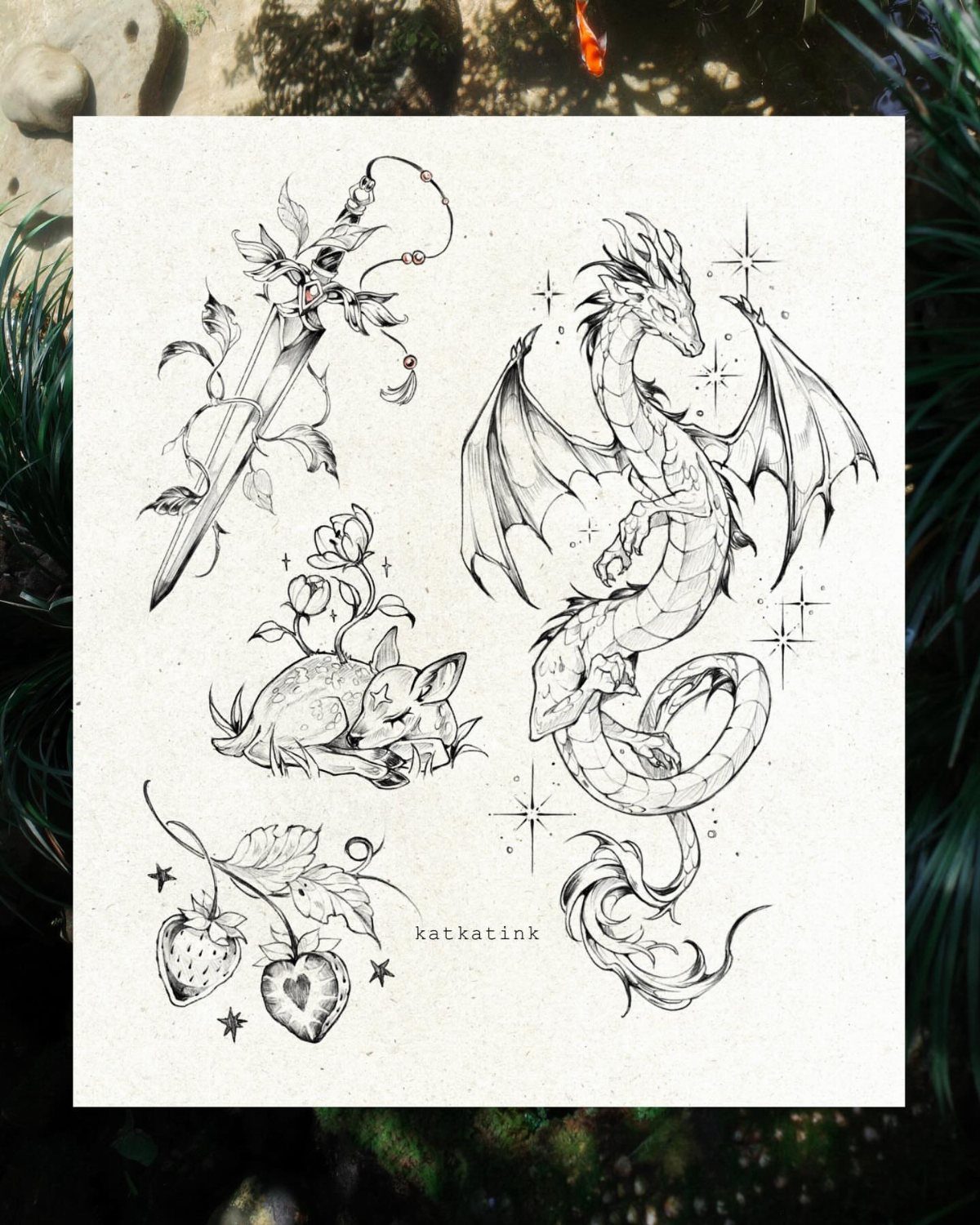 Black line art tattoo designs of a dragon, sword, fox, and strawberries on paper.
